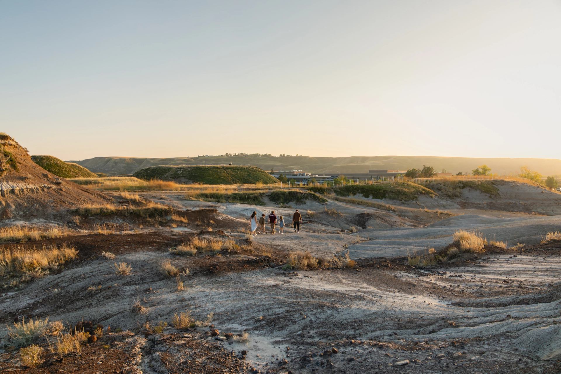 A family walk among the hoodoos around Royal Tyrrell Museum.