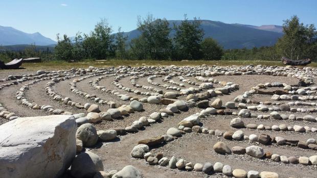 A scenic view of Grande Cache Labyrinth Park showcasing the intricate patterns of the labyrinths.