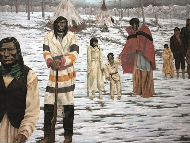 Winter mural of people in traditional clothing with tipis in snowy High River landscape.