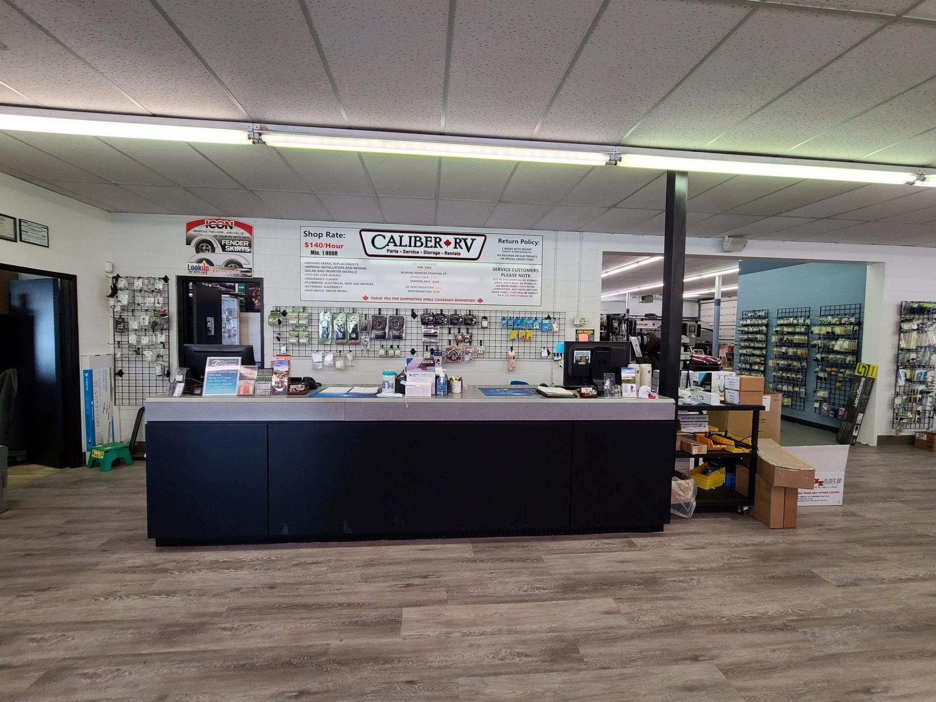 Customer service counter in a well-lit RV parts and accessories store.