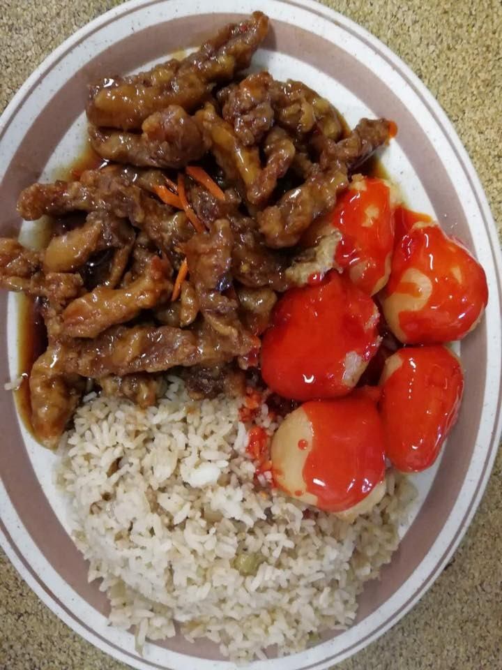 Plate with fried rice, sweet and sour meatballs, and crispy beef strips
