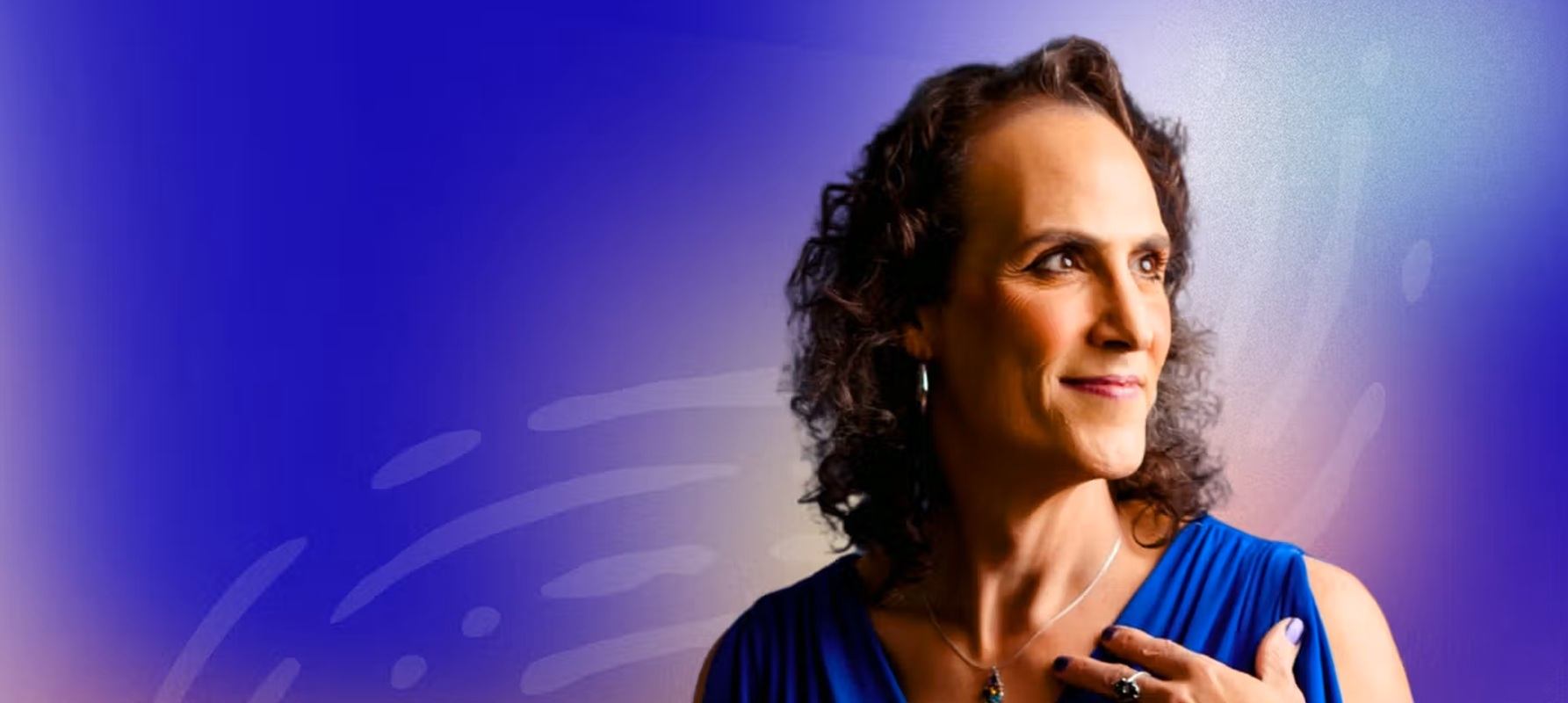 Person in blue sleeveless top looks to the side against purple gradient background.