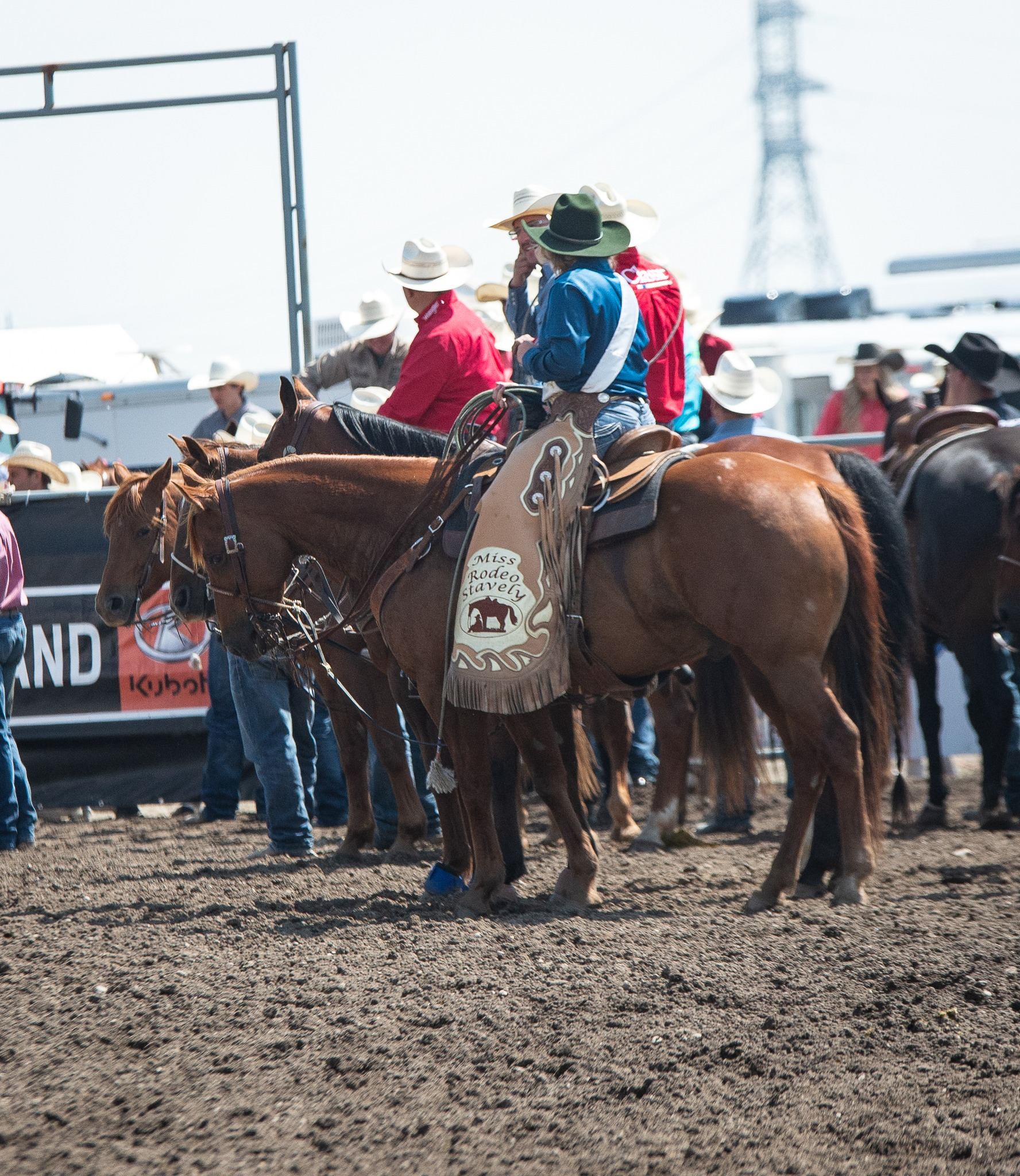 Rodeo participants on horseback gathered in the arena before an event at the Stavely Pro Rodeo.