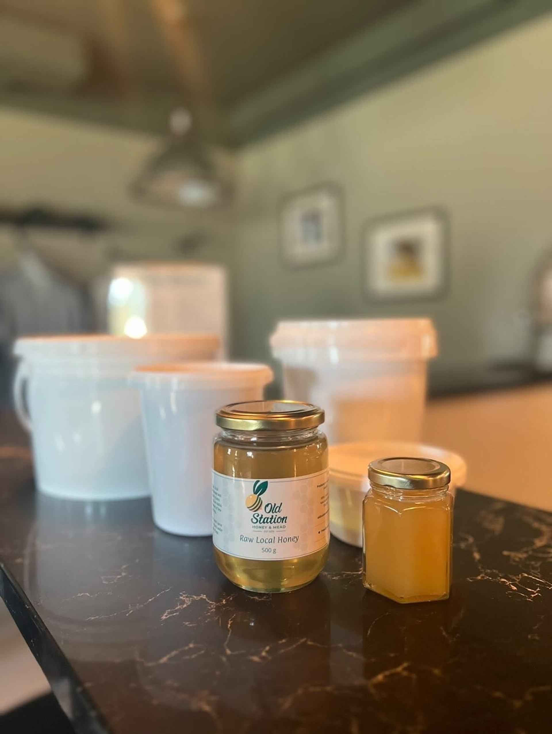 Old Station Honey & Mead showcases jars of raw local honey ready for visitors to enjoy.