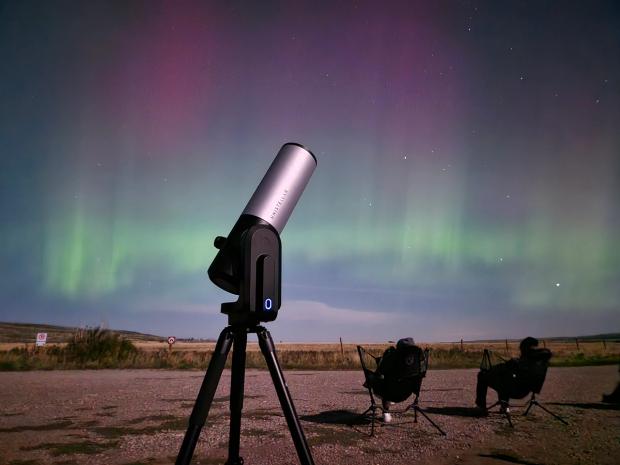 Guests relax in comfortable recliner-style stargazing chairs.