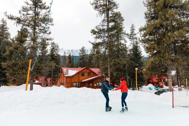 Couple ice skating at Baker Creek Mountain Resort