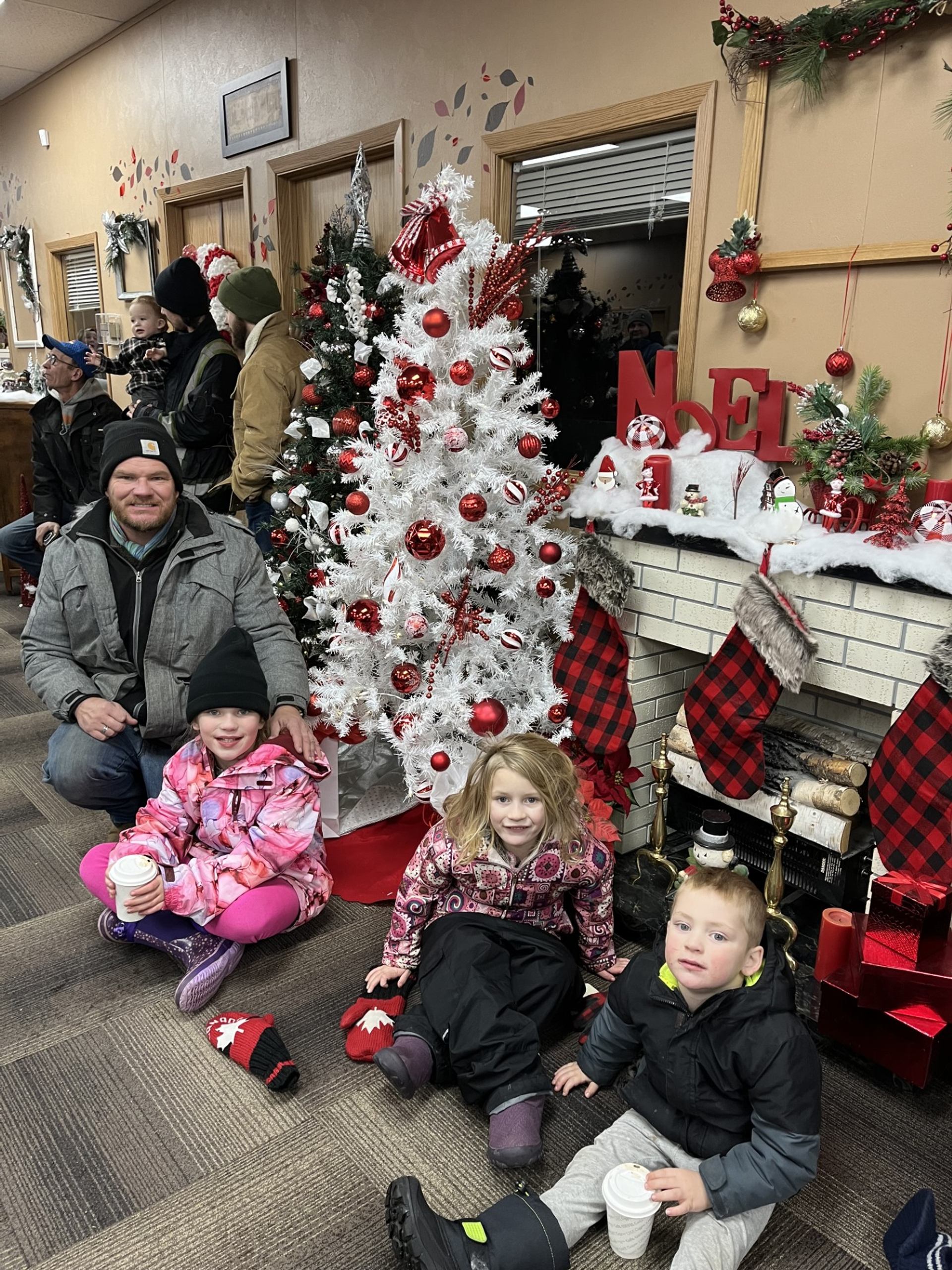 Family waits for their turn to visit Santa