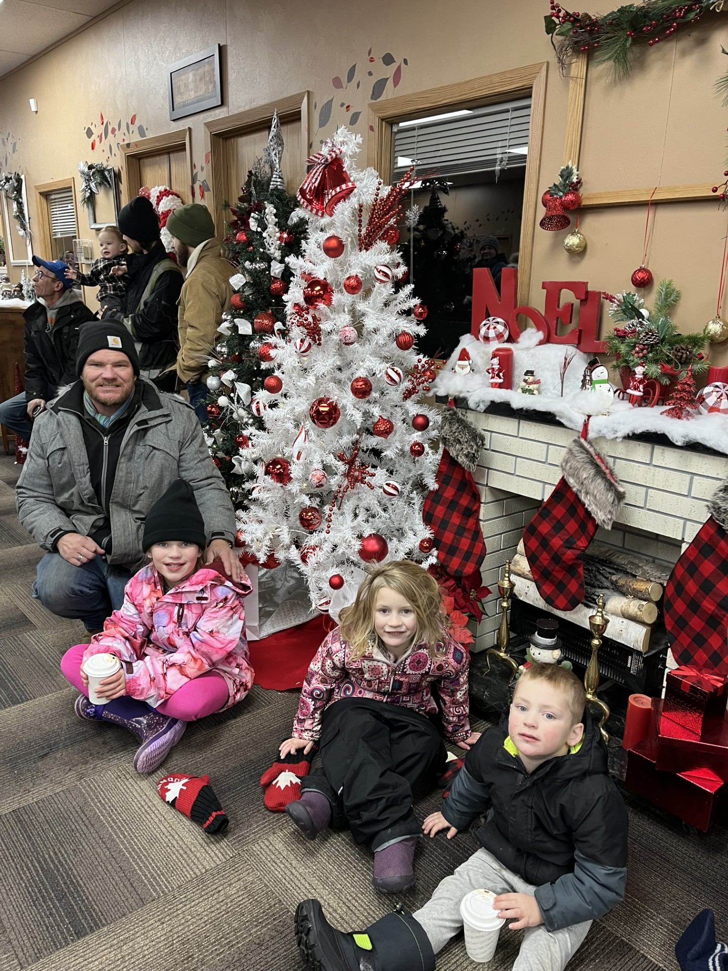 Family waits for their turn to visit Santa