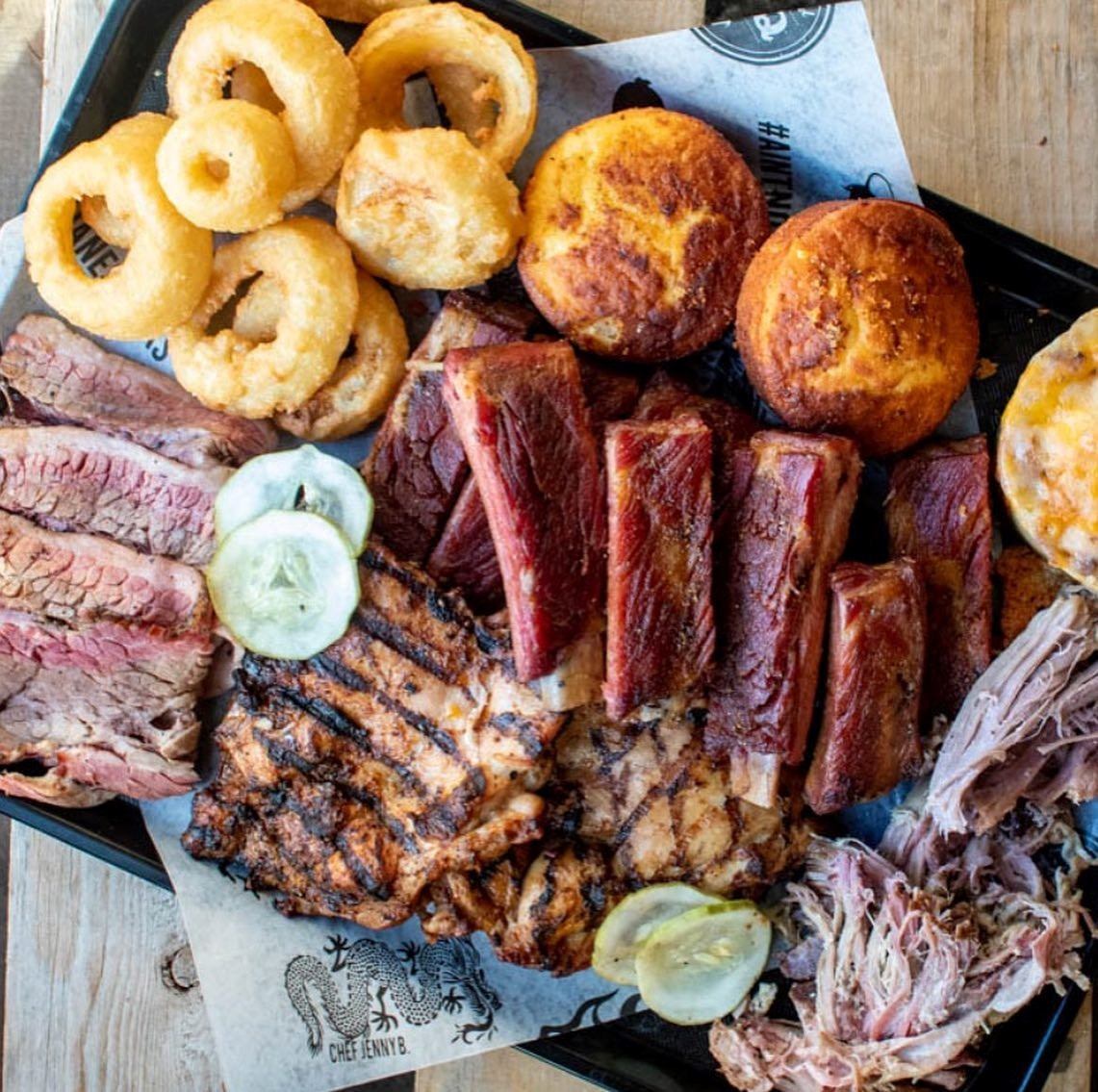 Close-up of a variety platter served on a dark plate.