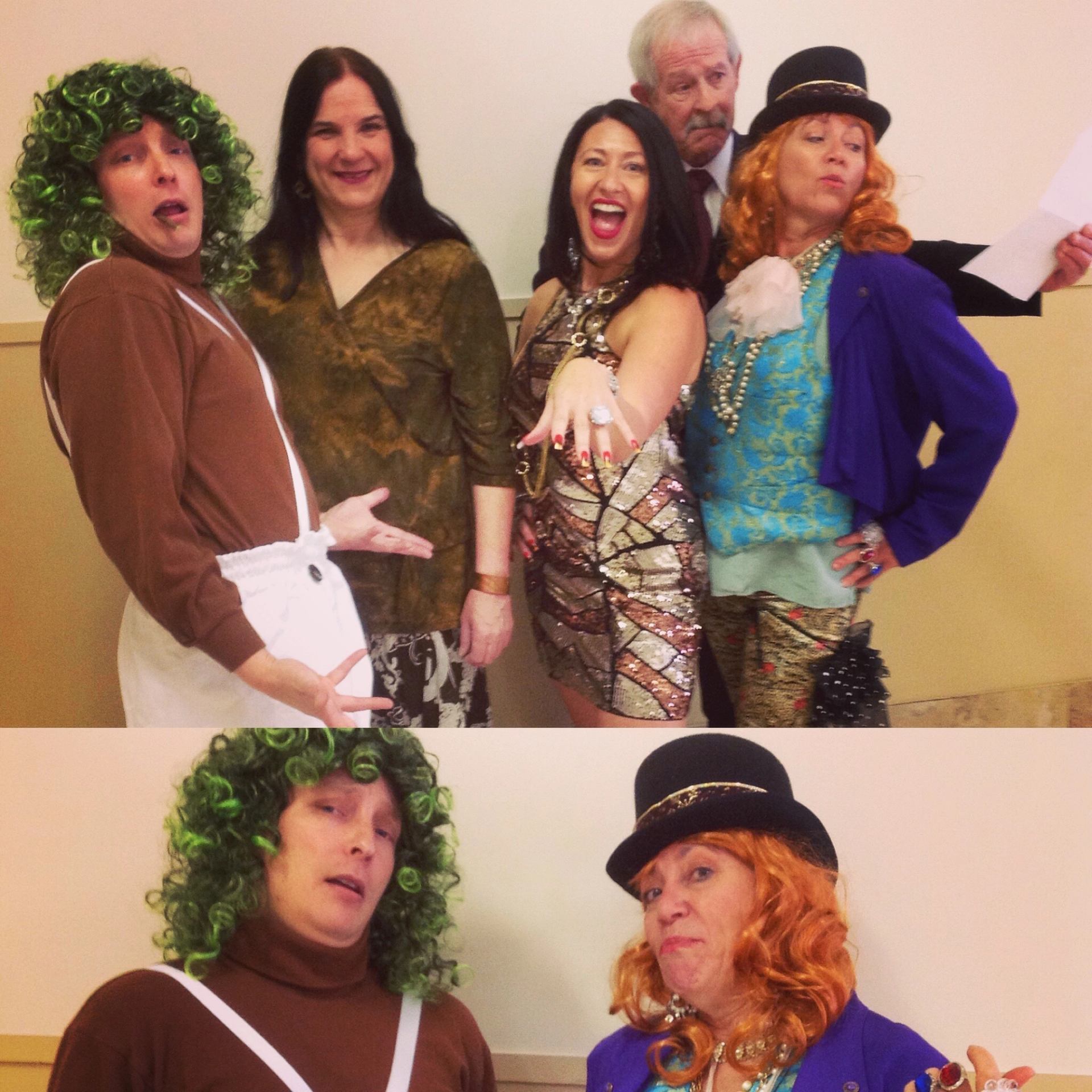 Group of performers in colorful, theatrical costumes posing together for a comic mystery dinner theatre production.