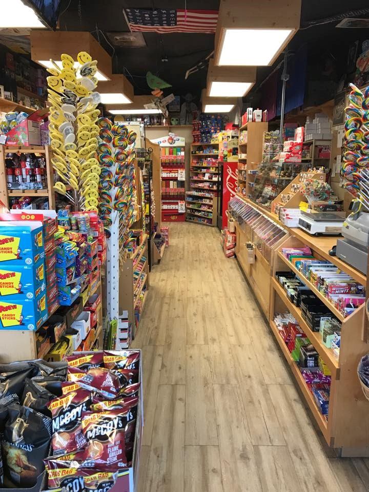Interior display shelves with varieties of candy.