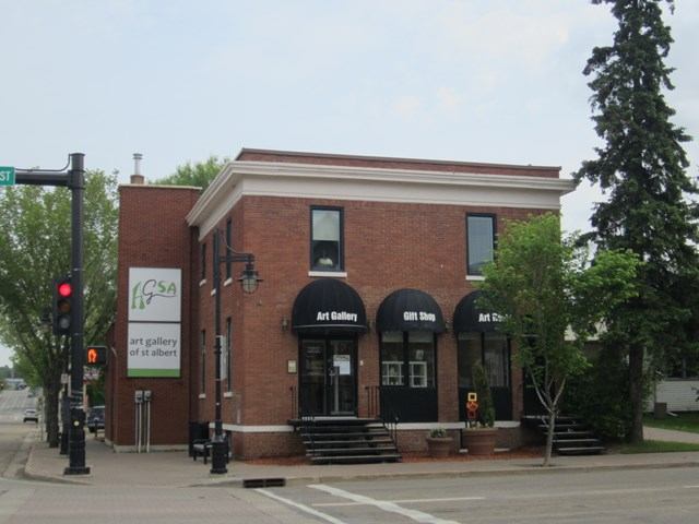 Art Gallery of St. Albert building with storefront signage and entrance steps on a street.