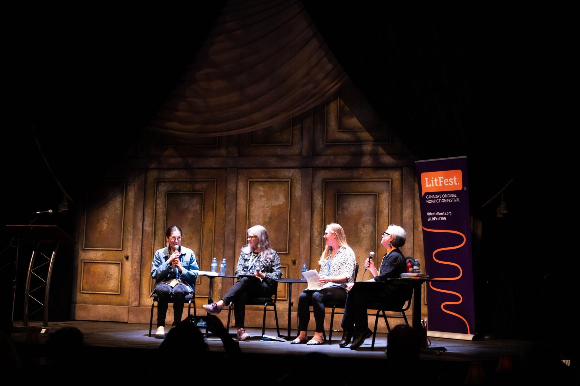 LitFest panelists speaking during a live event