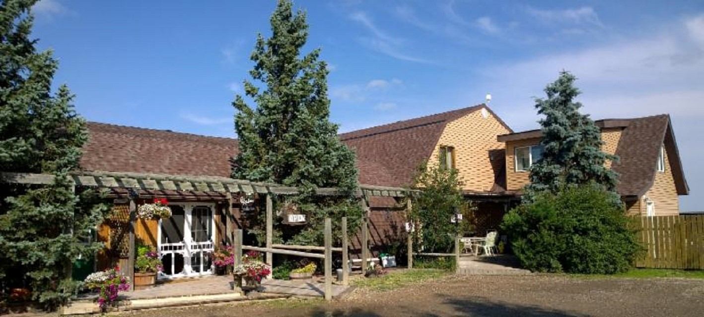 The exterior of Pasu Farm building.
