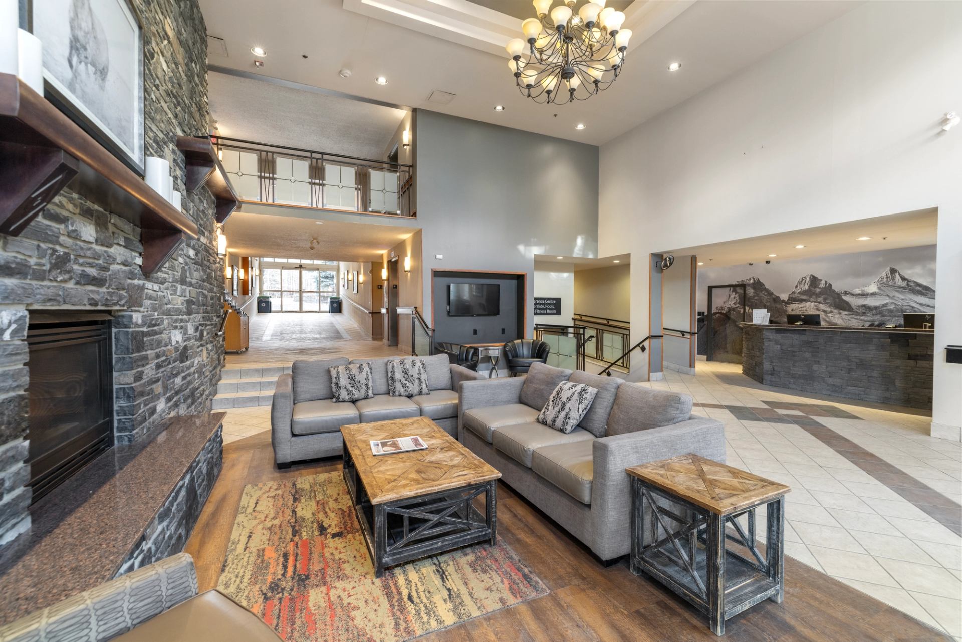 Lobby at the Pocaterra Inn. Includes large fireplace and seating area.