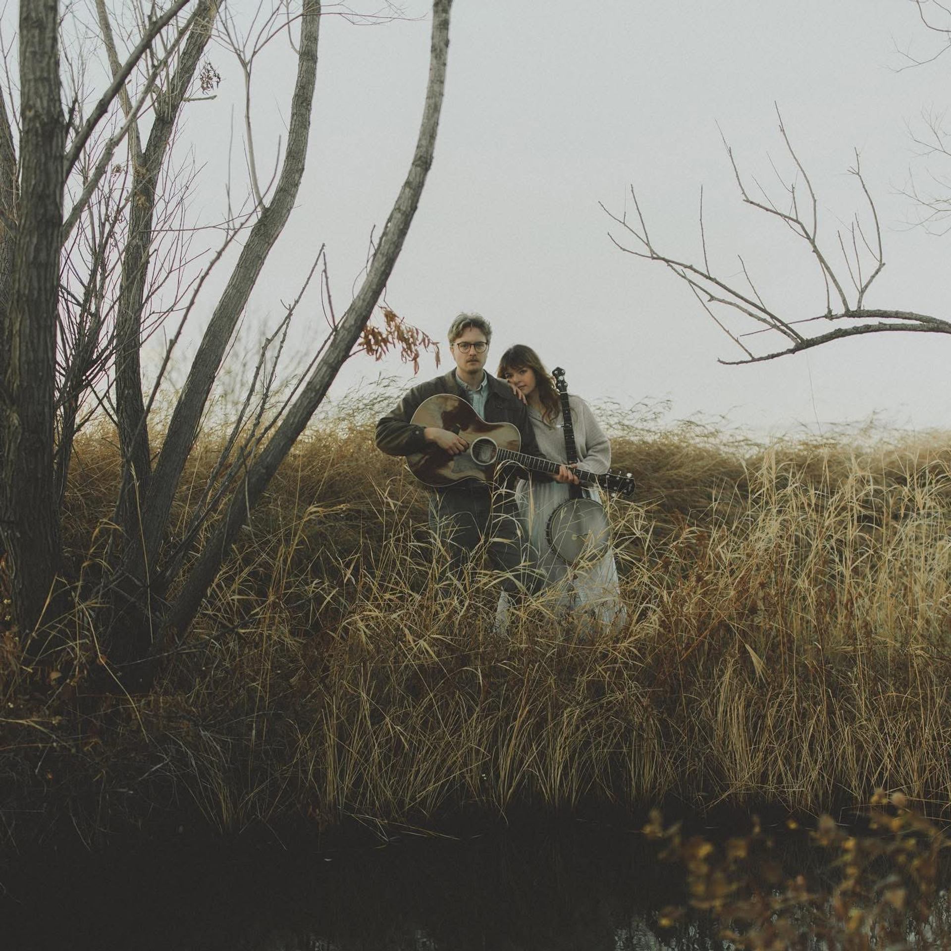 Jed & The Valentine in a field of grass.