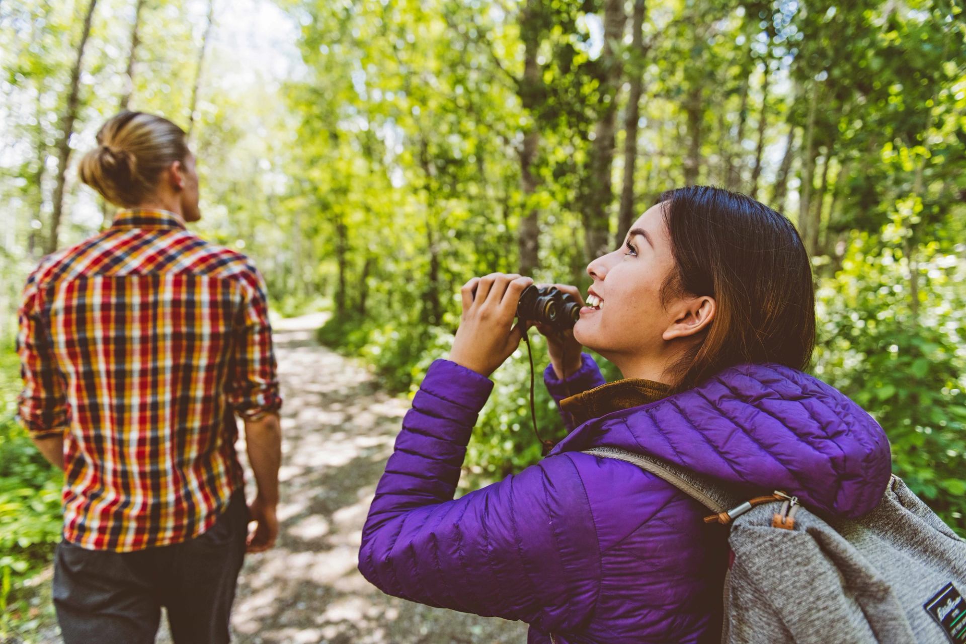 Hikers bird watching at Pigeon Lake Campground.