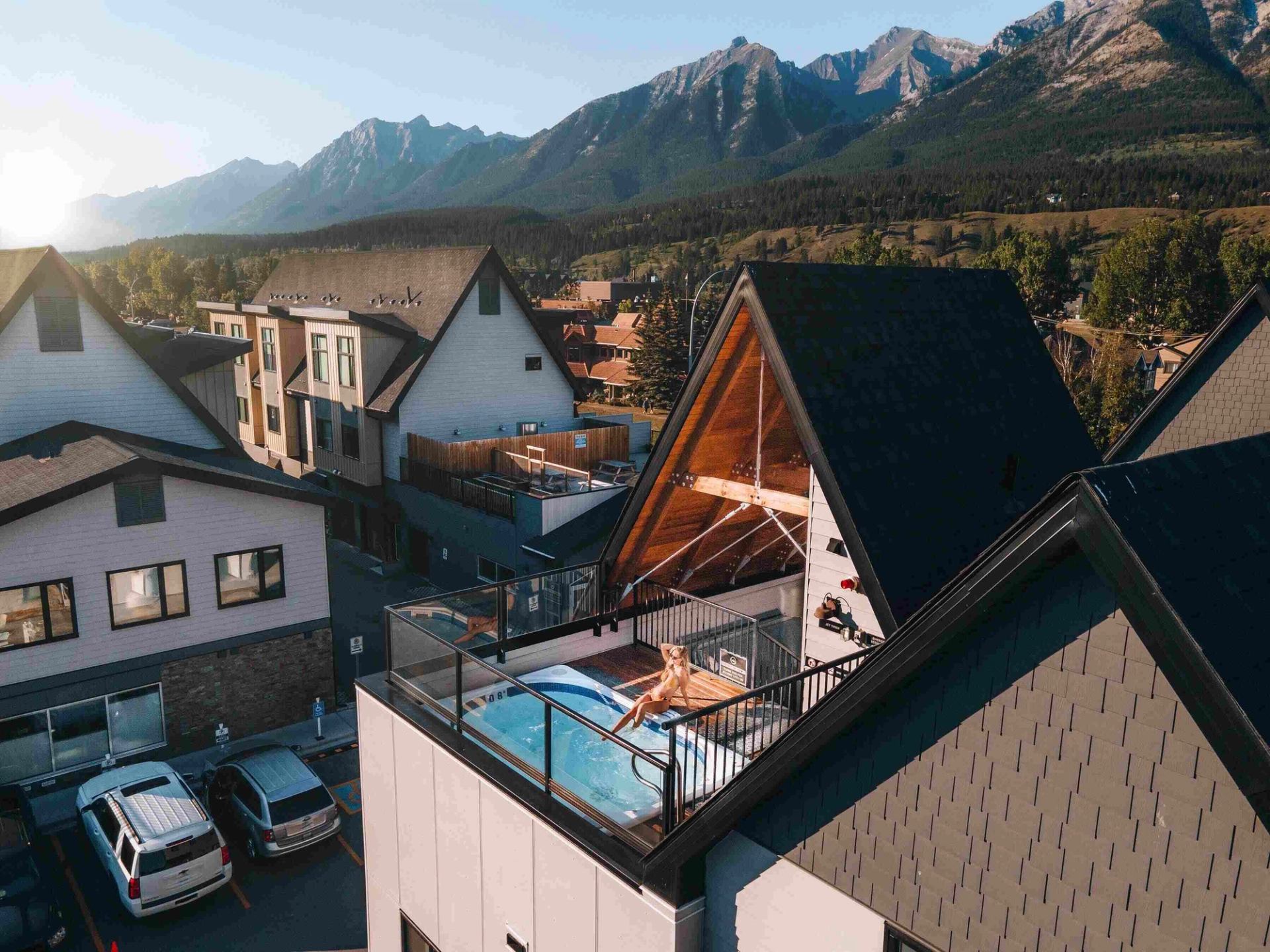 Exterior of the resort with a rooftop hot tub.