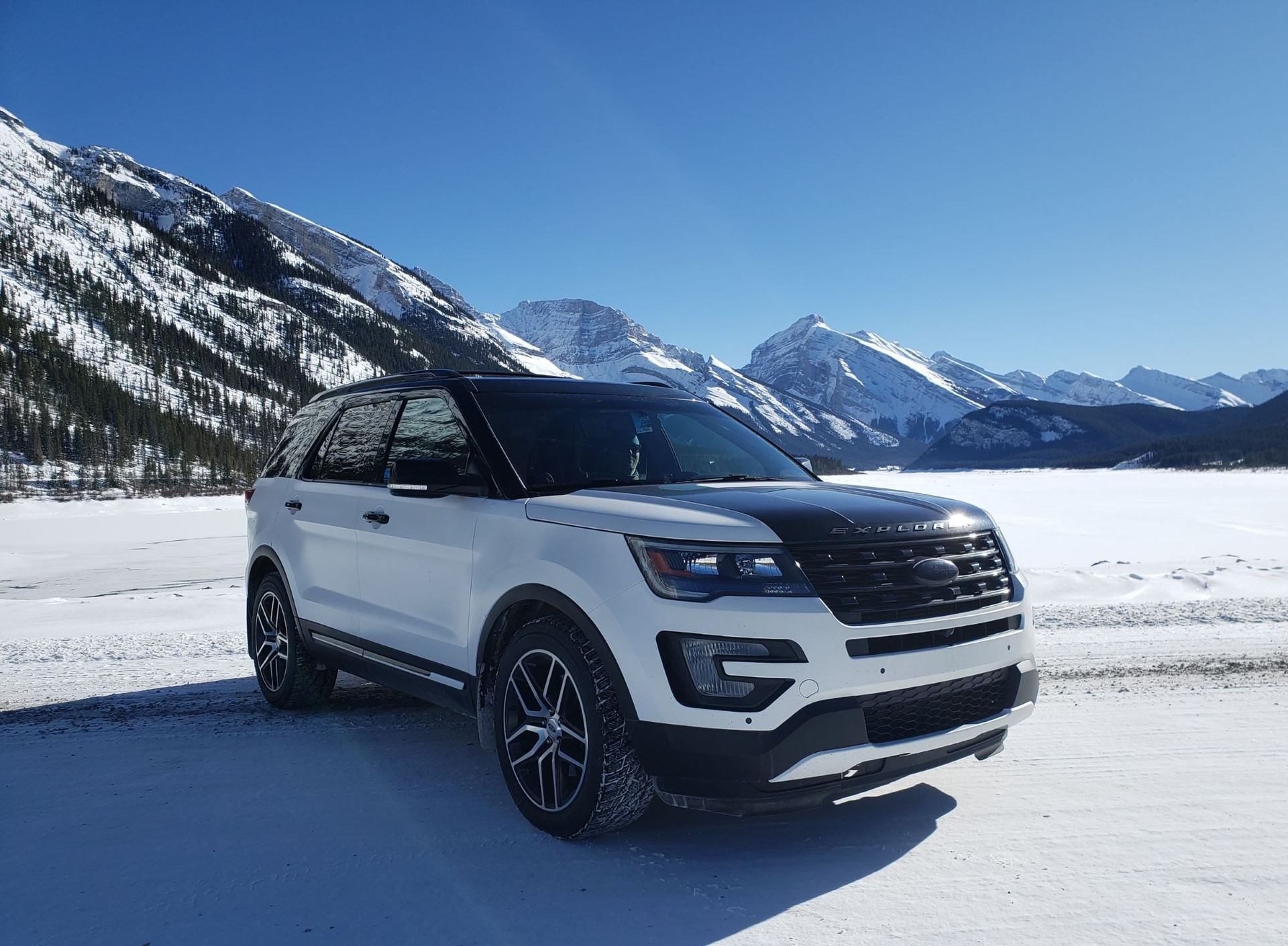 SUV for private transfers in Calgary, Banff, Lake Louise, Jasper, Golden BC area with winter studded tires, leather seats and a sunroof
