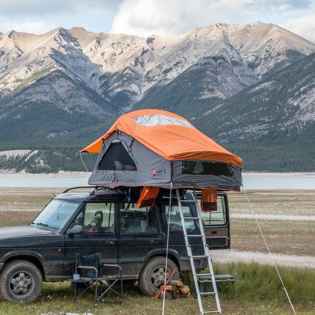 A 4X4 with a rooftop tent.