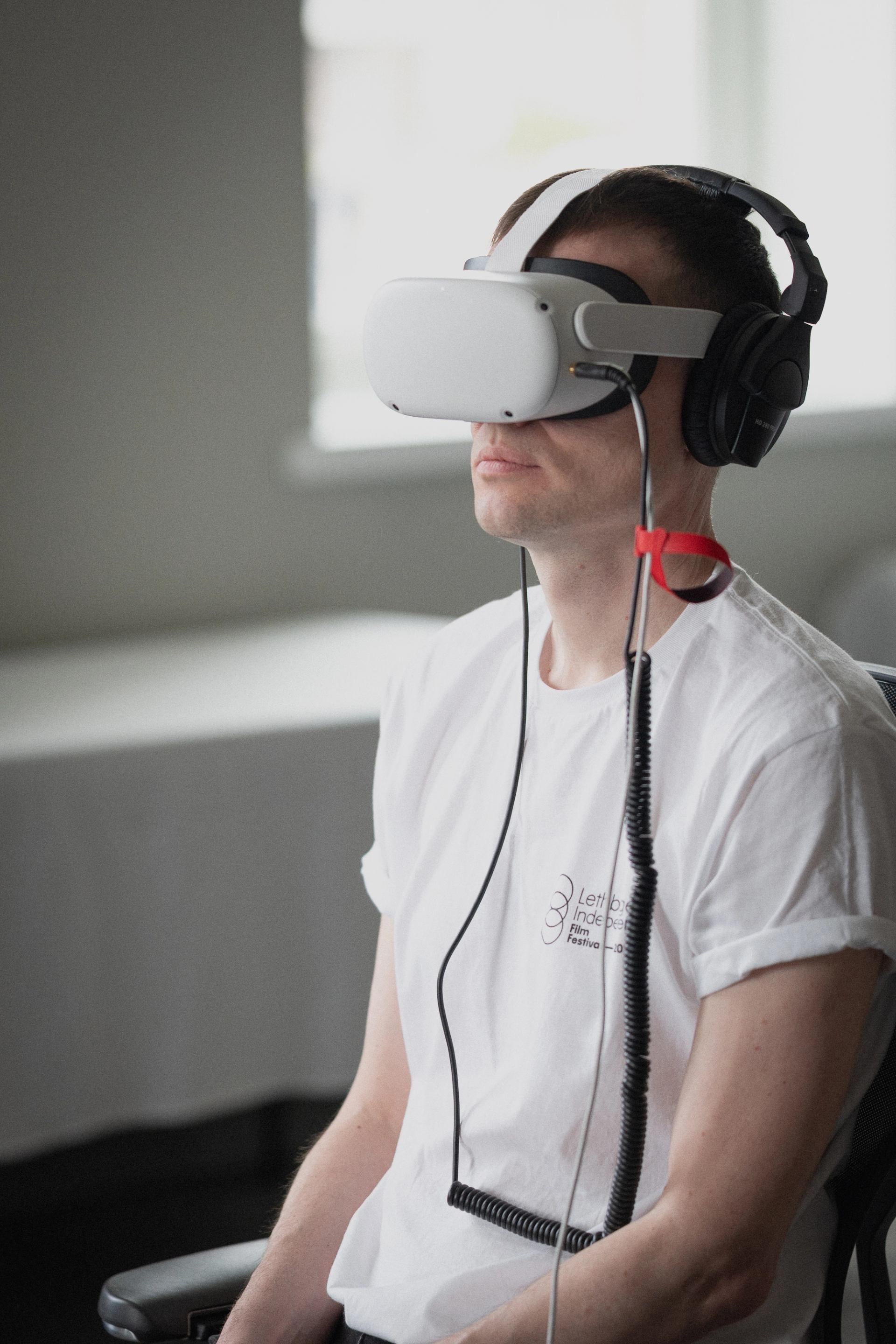 Person with VR headset mounted on head  