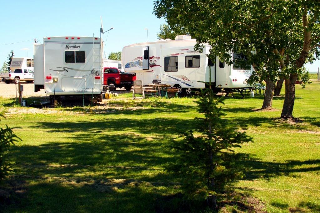 A couple RVs on a campsite