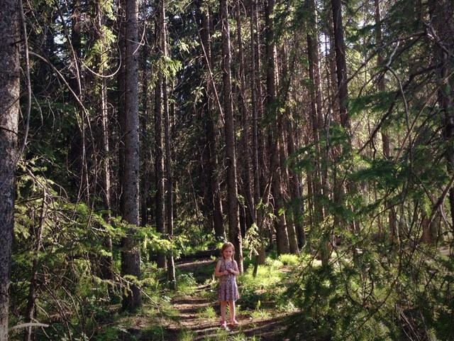 A child walking on a path in the park