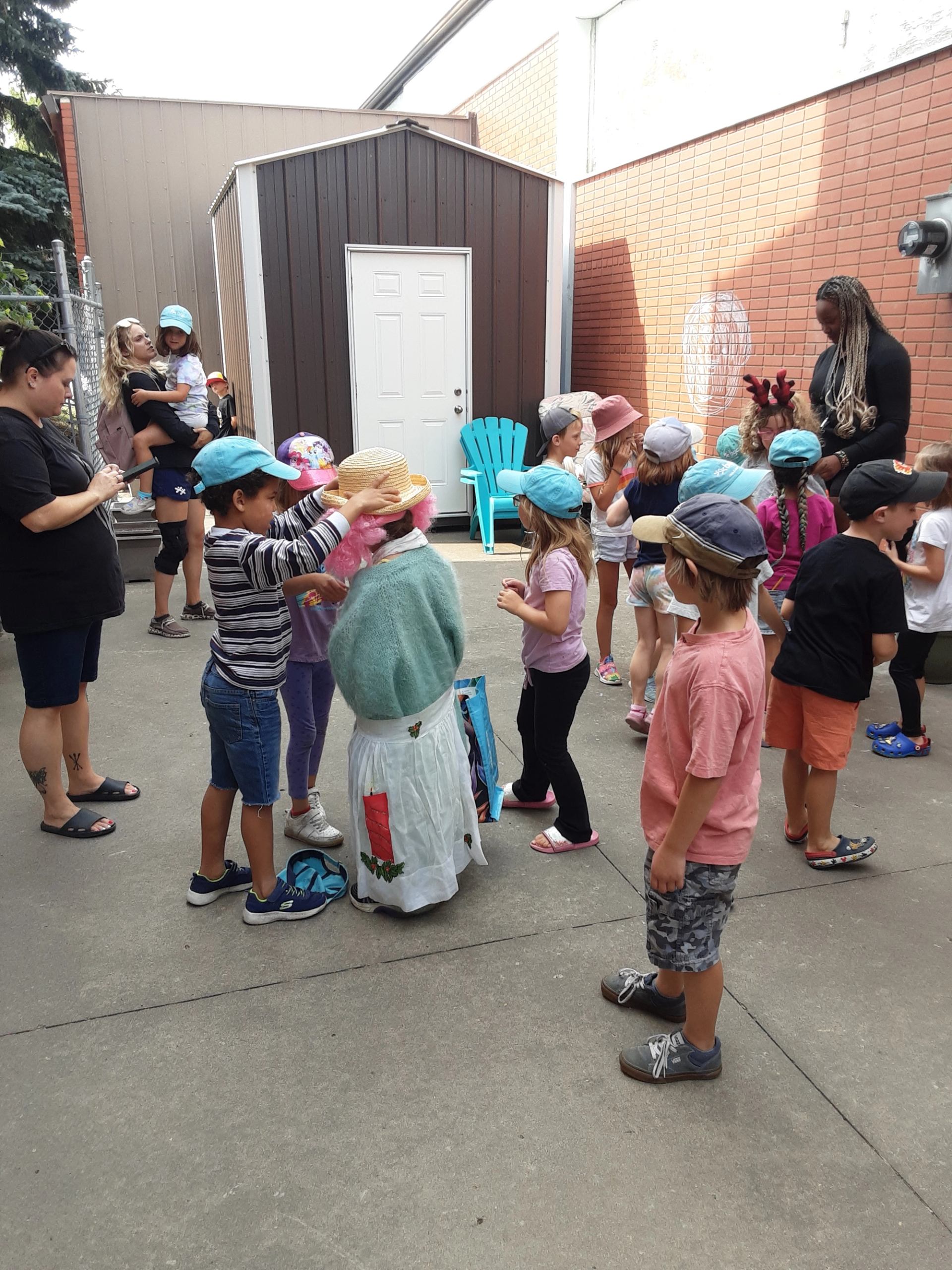 This photo shows a group of children playing the game "Statue".