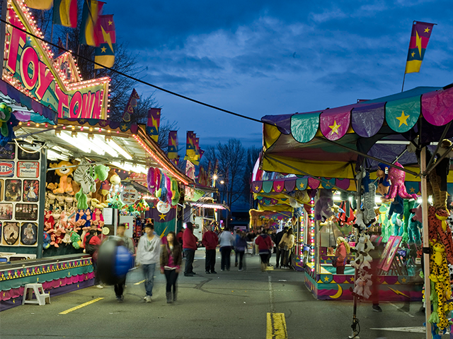 Friends walking around the fair grounds