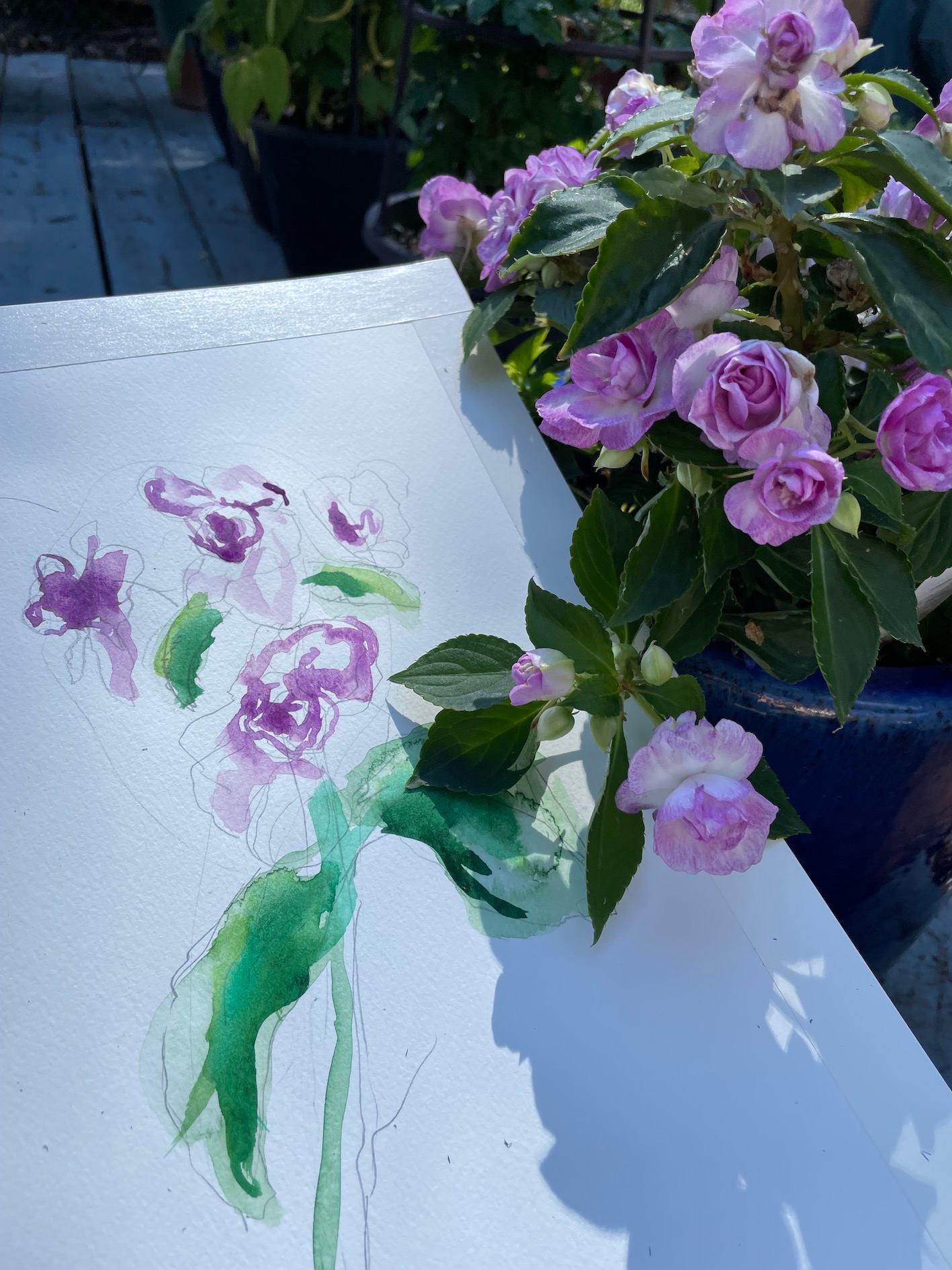 A painting of purple flowers.