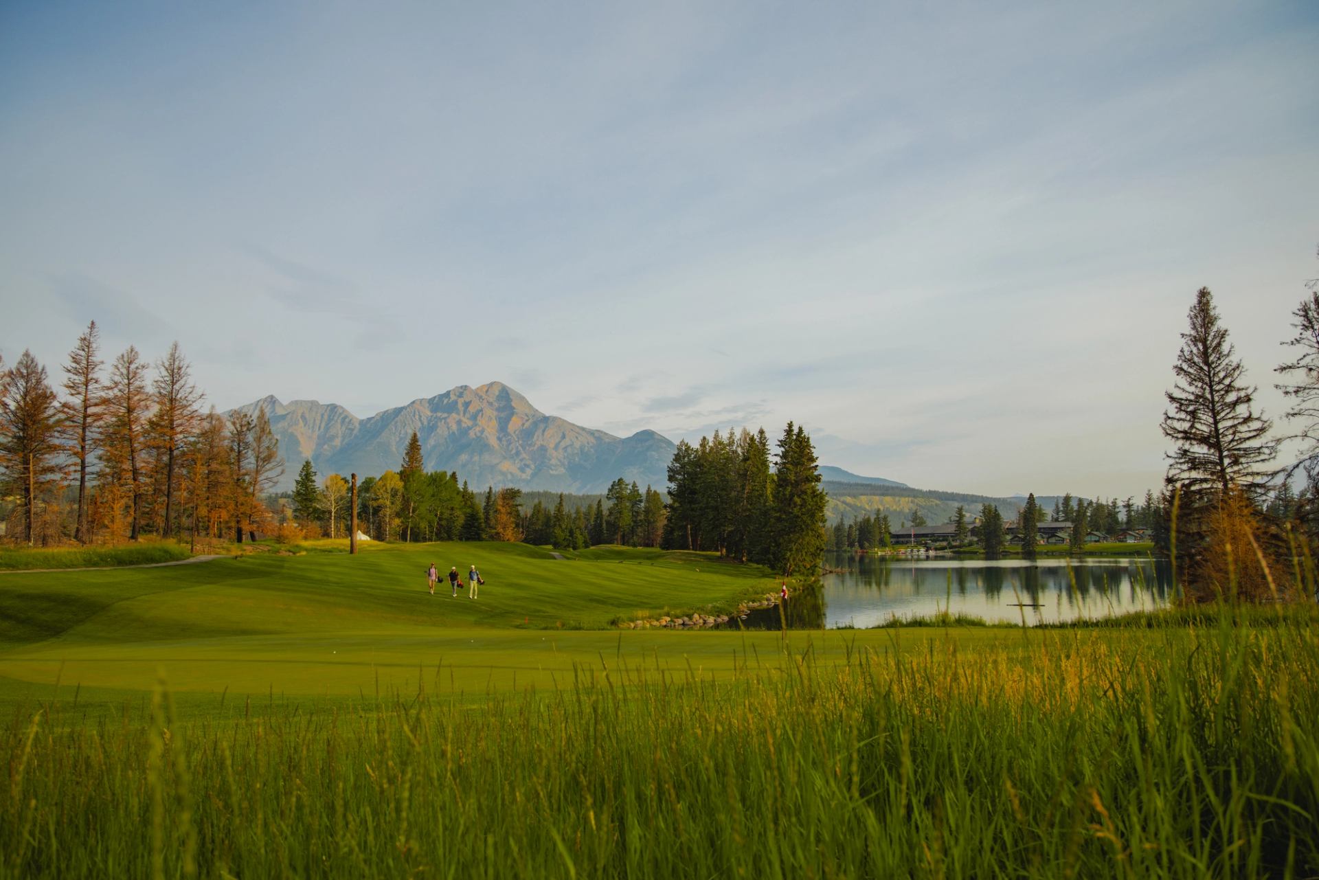 Early morning golf game with a group at Fairmont Jasper Park Lodge Golf Course.