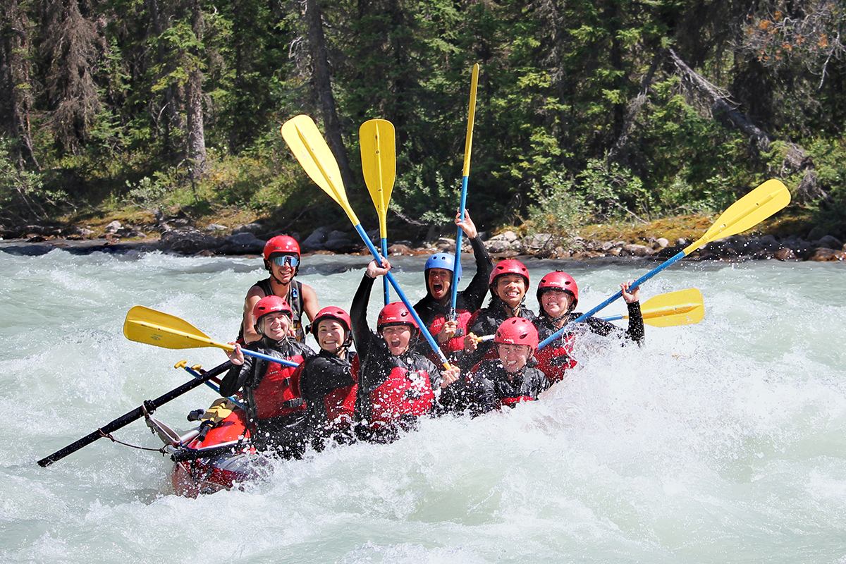 A group of people rafting