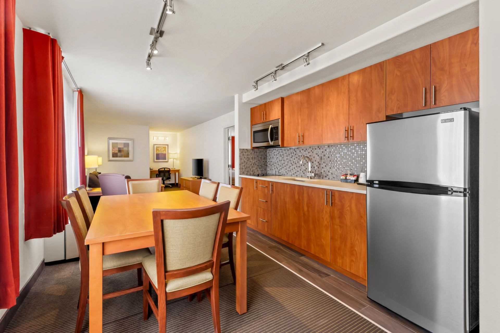 Larger suite with kitchenette and separate bedroom.