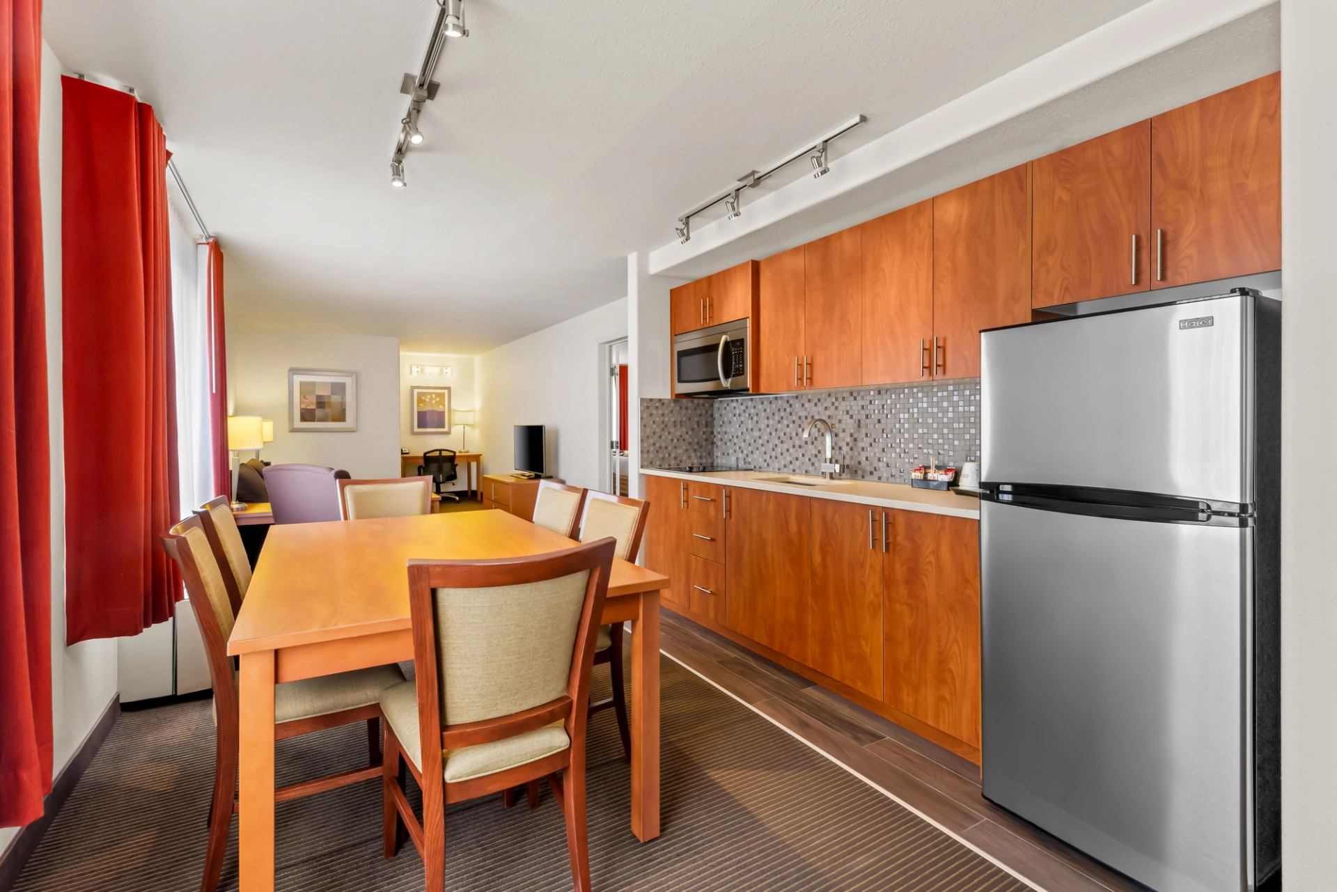 Larger suite with kitchenette and separate bedroom.