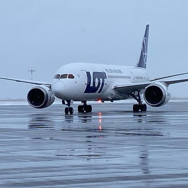 A passenger airplane on a when surface.