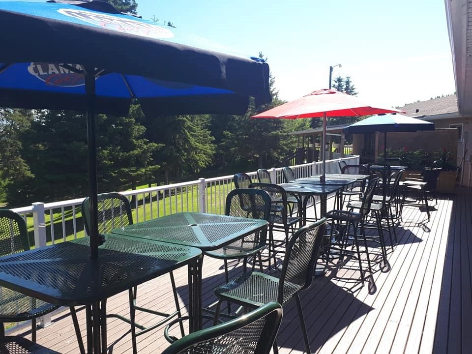 Outdoor patio with tables and chairs