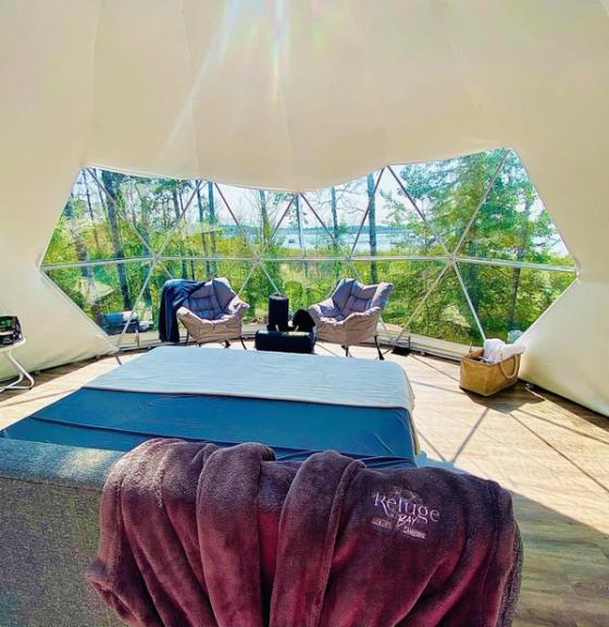 Interior living space of a glamping dome.