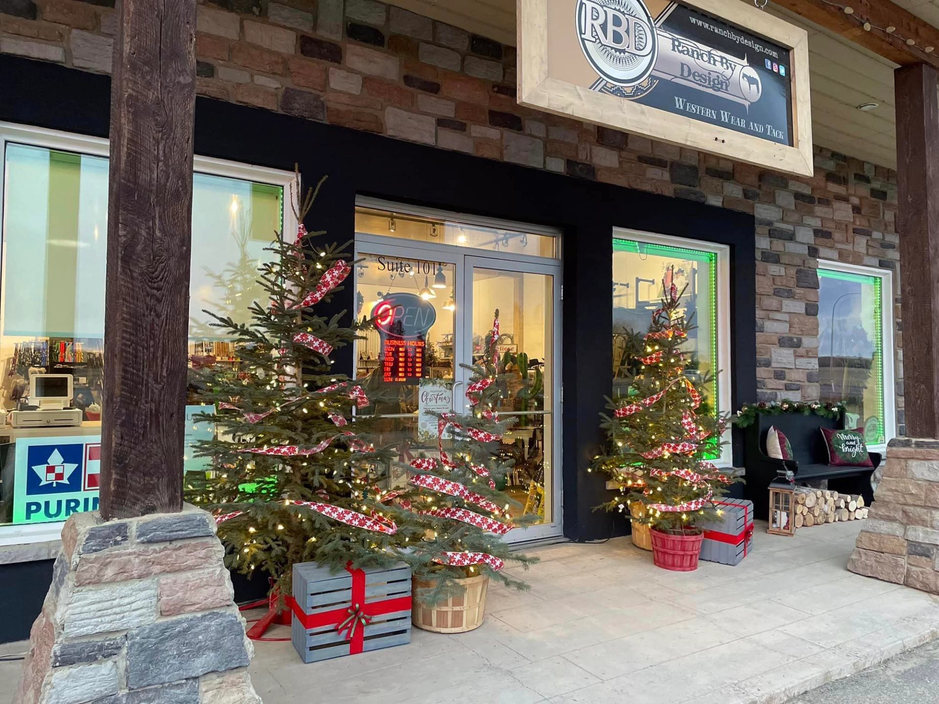 Exterior of Ranch By Design during christmas time with the store decorated.