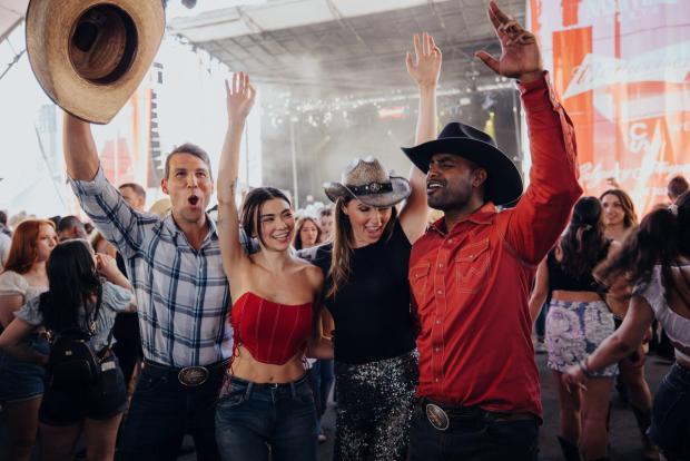 People dancing at Nashville North at the Calgary Stampede.