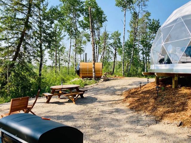 The exterior grounds of a glamping dome at Rufge Bay.