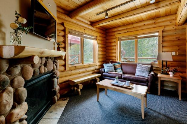 The interior living room of a cabin at Miette Mountain.