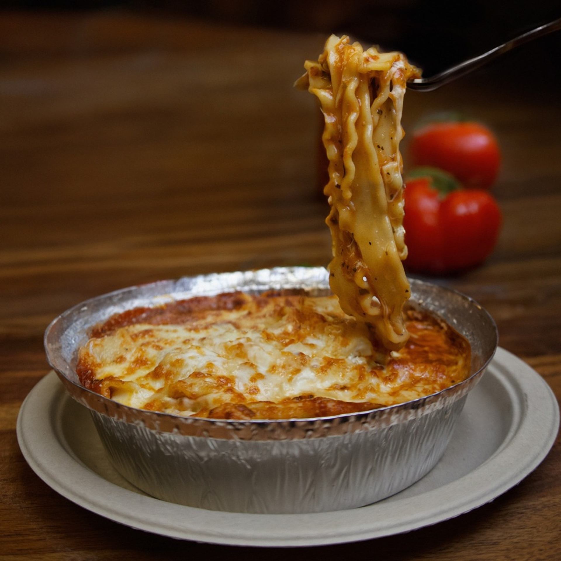 Hearty oven-baked lasagna with rich meat sauce and melted mozzarella cheese.