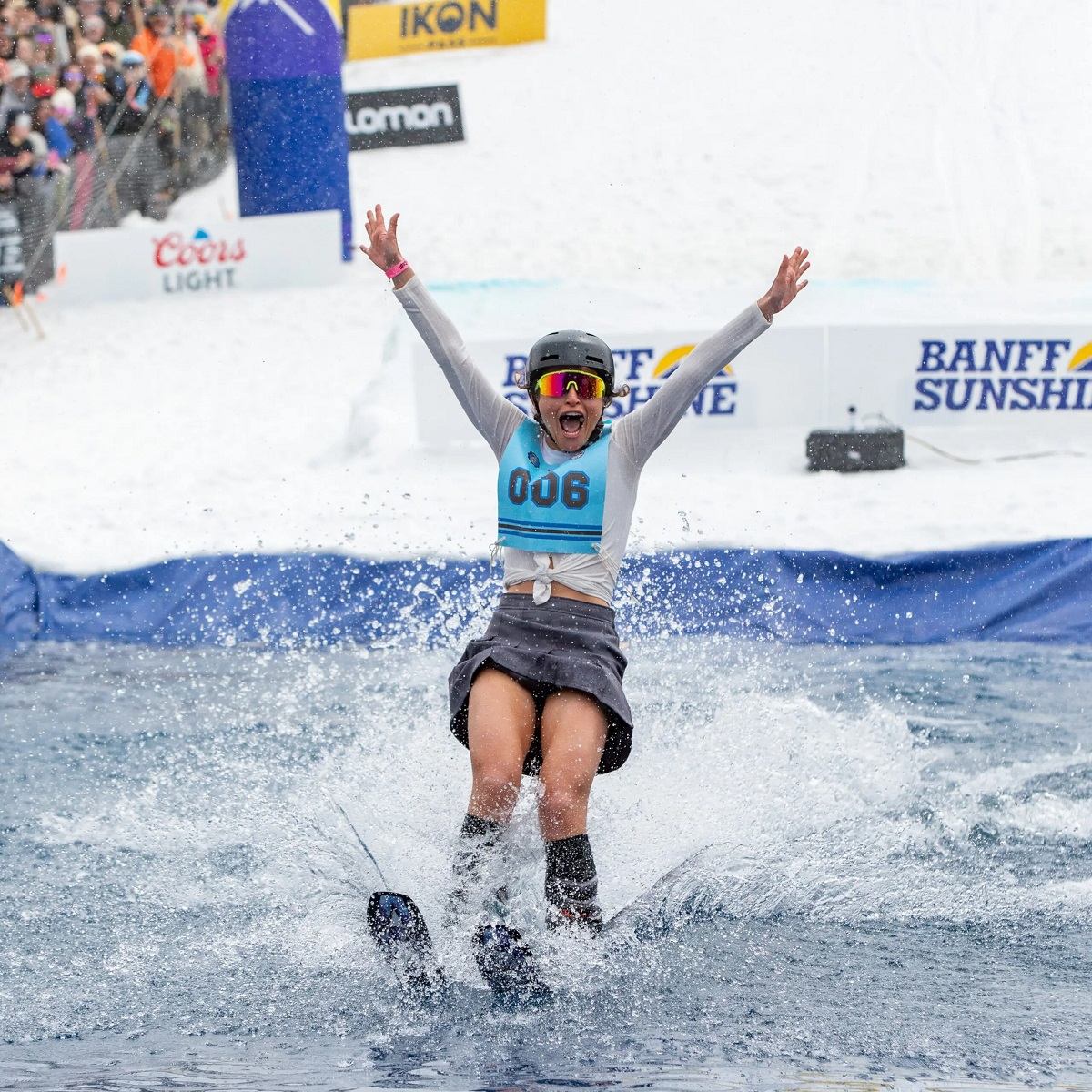Skier landing in a pool of water during the Slush Cup event at Banff Sunshine Village..