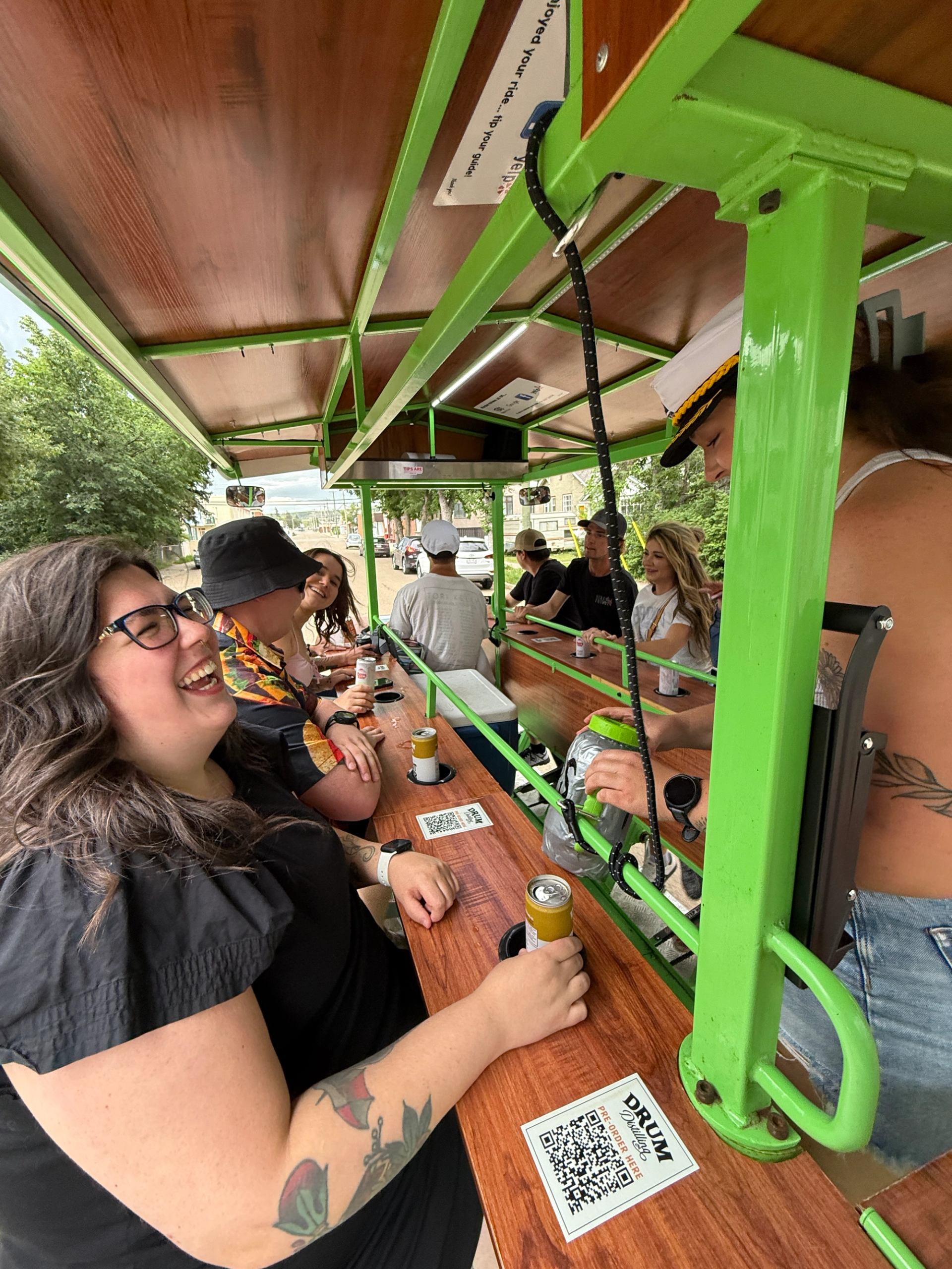 People on the Pedal Tour enjoying beverages.