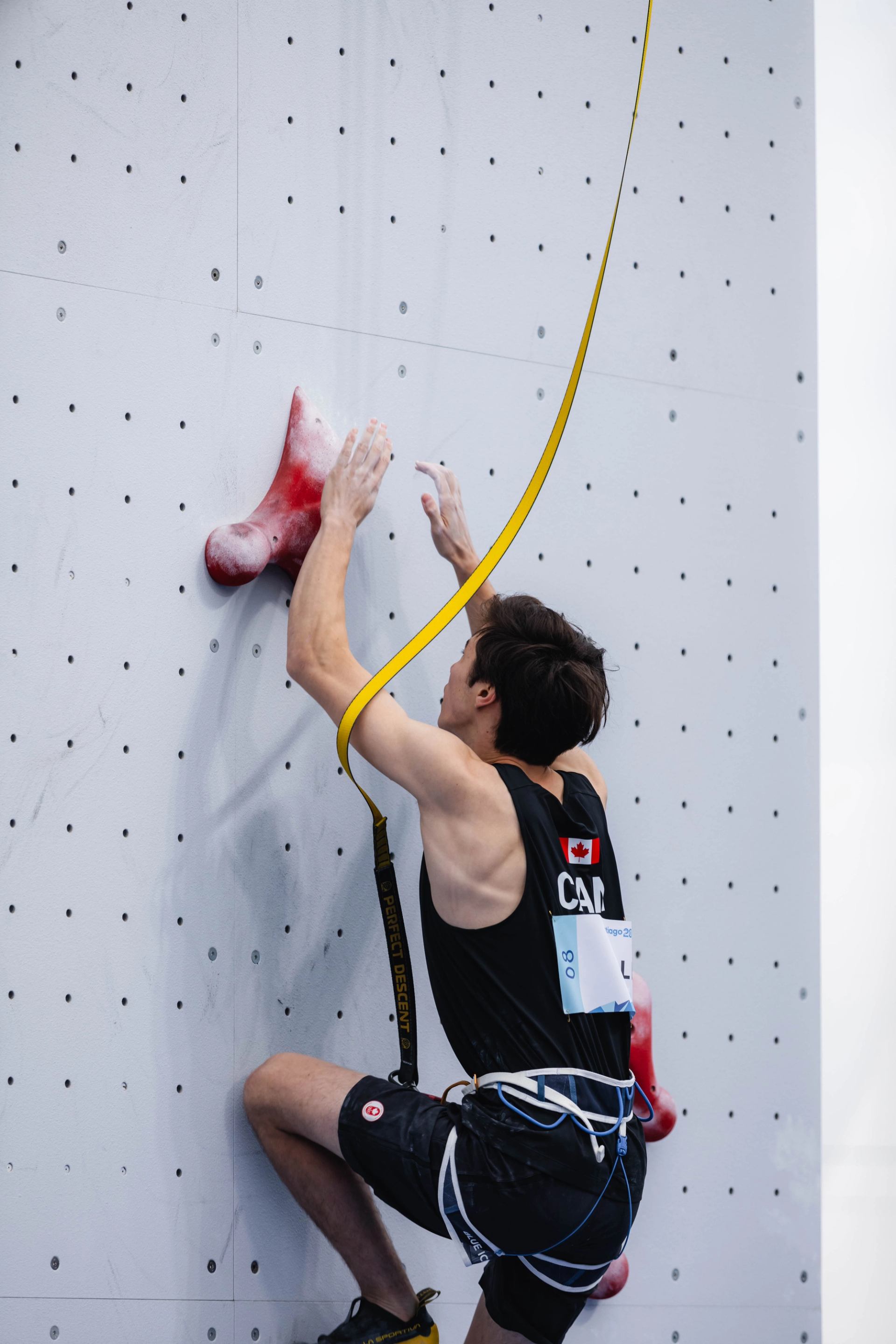 A person climbing up a wall.