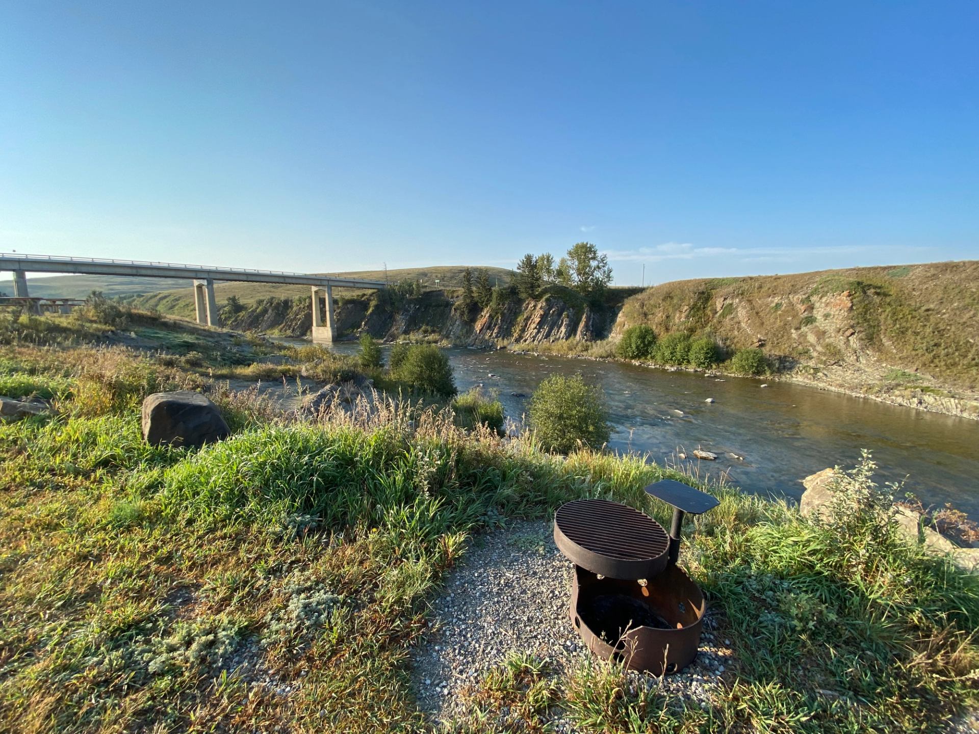 Firepits at the Maycroft PRA campsite overlooking the river