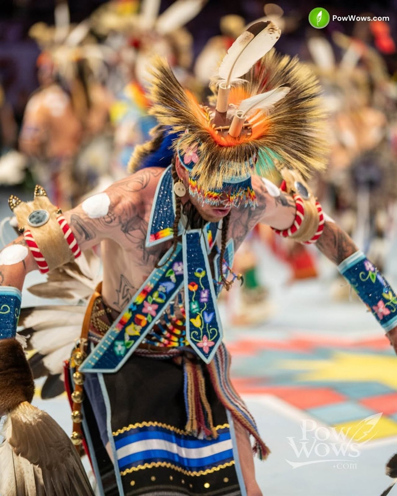 Piikani powwow dancer performs in colourful regalia