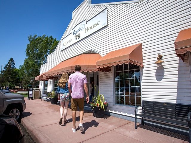 Visitors walking up to the Rosebud Opera House.