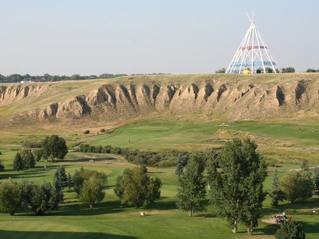 Golf Course & Toptracer Range in Medicine Hat, Alberta, Canada, with the distinctive Saamis Tepee visible in the background.