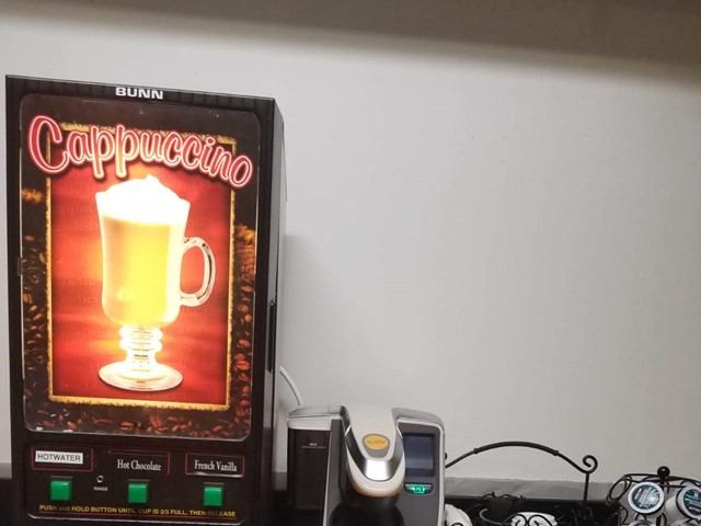Travelodge by Wyndham cappuccino machine and coffee station setup.